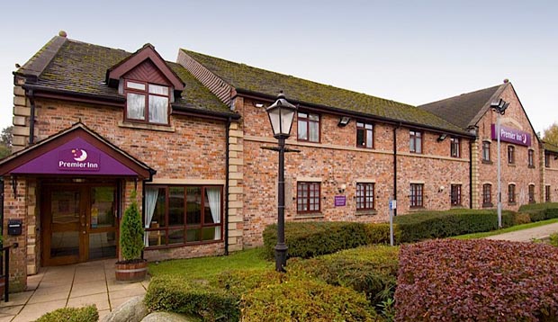 Exterior of Premier Inn Rochdale showing gardens