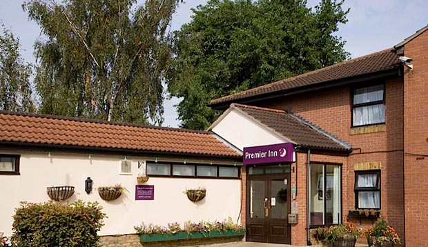 Exterior of Premier Inn London Romford West showing entrance to reception