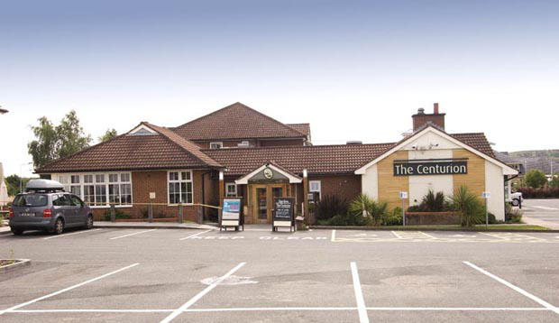 Exterior at Premier Inn Tamworth South showing car park and restaurant