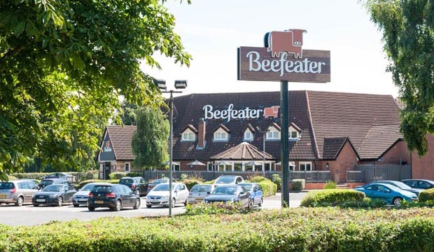 Exterior of Premier Inn Tamworth Central showing Beefeater restaurant and car park