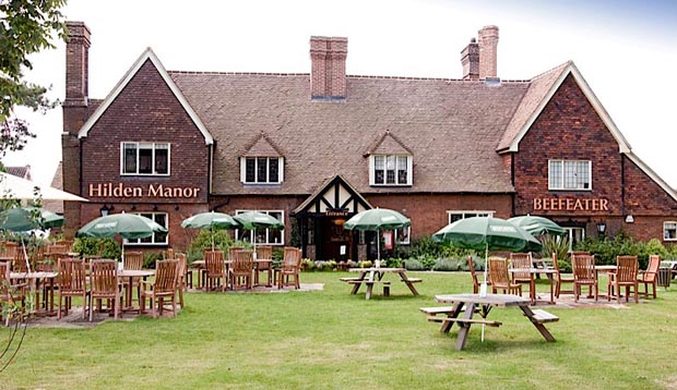 Exterior at Premier Inn Tonbridge North showing outdoors restaurant area 